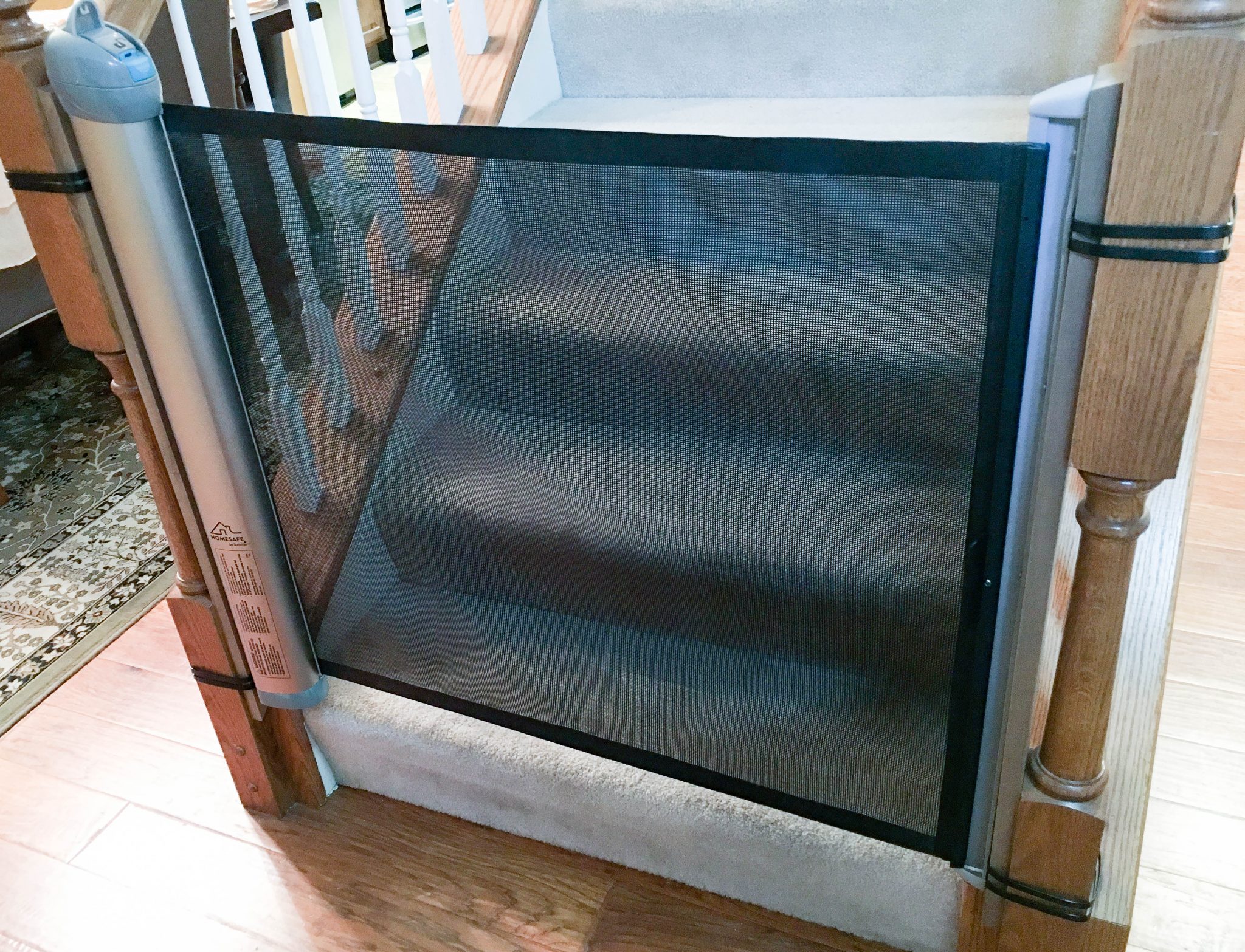 retractable baby gate top of stairs